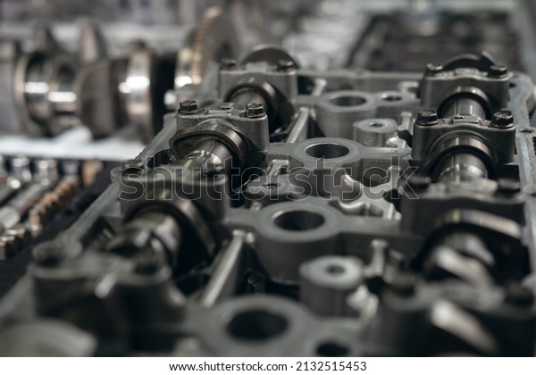 Engine\
valve car maintenance.The cylinder block of the four-cylinder\
engine. Disassembled motor vehicle for\
repair