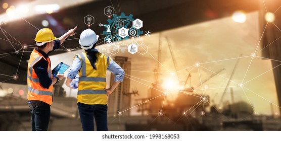 Engineer   Architect analyzing under construction project and technology   new innovative digital tablet   icon network construction virtual interface  