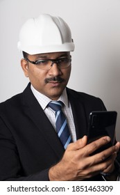 An Engineer architect business man at a construction site
