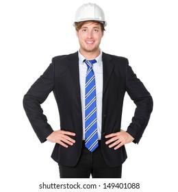 Engineer Or Architect Business Man In Suit. Male Businessman Wearing White Hard Hat Helmet Smiling Happy, Proud And Confident. Portrait Of Young Male Engineer In His 20s Isolated On White Background.