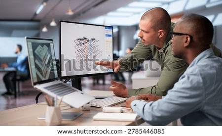 Engineer And Architect Collaborate On Digital 3D Building Design Using BIM Software.