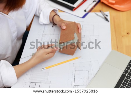 Engineer and Architect concept, Engineer Architects  and Interior designer office team working with blueprints