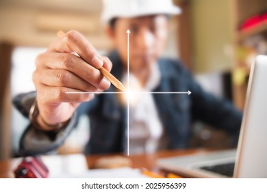 Engineer Or Architect Uses Pencil Pointing To X And Y Axis  For Beginning Construction Development