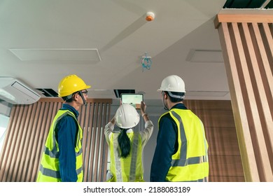 Engineer and architect working discussion plan in construction process interior with augmented reality technology on digital tablet. Concept technology in construction business.