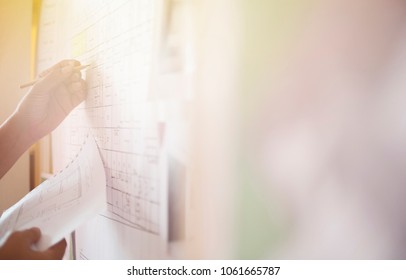 Engineer architect working pointing project drawing construction planning blueprint design table in the office workplace