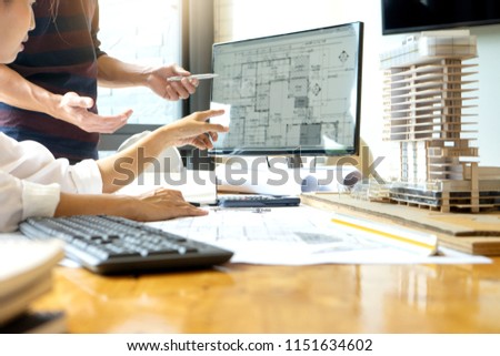 engineer or architectural project, two engineering or architecture discussing and working on blueprint with architect equipment, Construction concept.