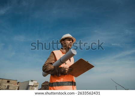 Engineer Boy In The Nature Looking At The Building To Remake 