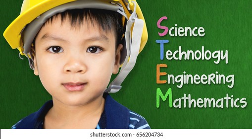 Engineer Boy Is Studying STEM Education On Black Board