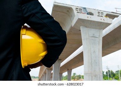 Engineer With Bridge Under Construction Background