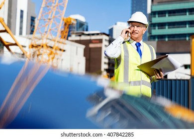 Engineer builder at construction site
