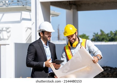 Engineer And Businessman Planning New Residential Subdivision Home Building In Construction Site.