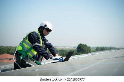 Engineer in charge of solar panel installation The installation of solar energy conversion into electricity for a warehouse is currently being investigated.