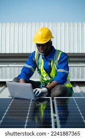 Engineer in charge of solar panel installation The installation of solar energy conversion into electricity for a warehouse is currently being investigated.