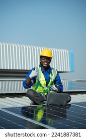Engineer in charge of solar panel installation The installation of solar energy conversion into electricity for a warehouse is currently being investigated.