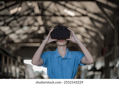 Engineer checking construction process railway and wearing virtual reality glasses(VR) checking work on railroad station . Railway engineer checking machines with virtual reality glasses(VR)