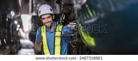Engineer checking construction process railway and checking work on railroad station . Railway engineer checking machines in train station. Train engineer concept