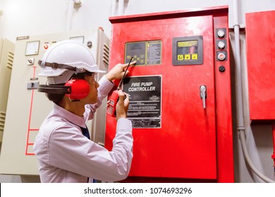 Engineer checking Industrial fire control system,Fire Alarm controller, Fire notifier, Anti fire.System ready In the event of a fire.