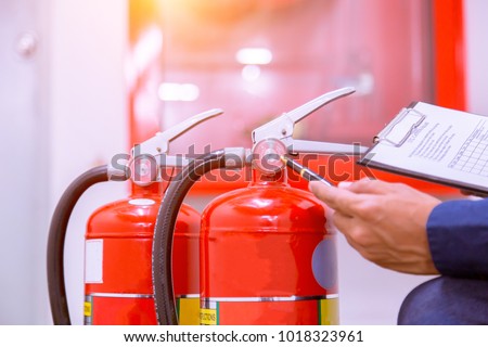Engineer checking Industrial fire control system,Fire Alarm controller, Fire notifier, Anti fire.System ready In the event of a fire.