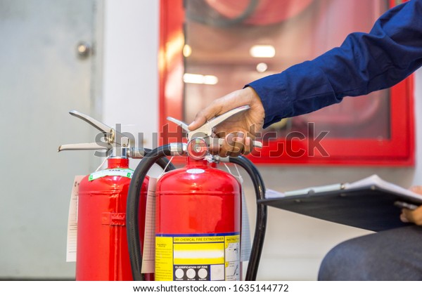 Engineer checking Industrial fire control system,Fire Alarm controller ...