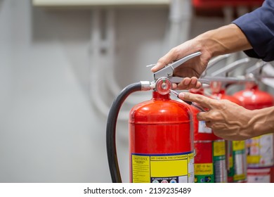 Engineer Are Checking And Inspection A Fire Extinguishers Tank In The Fire Control Room For Safety Training And Fire Prevention.