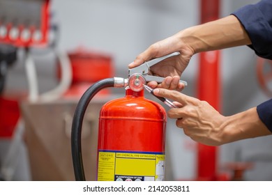 Engineer Are Checking And Inspection A Fire Extinguishers Tank In The Fire Control Room For Safety Training And Fire Prevention.