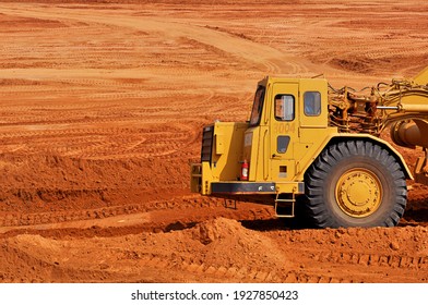 Engineer And Civil Construction With Tractors On Site