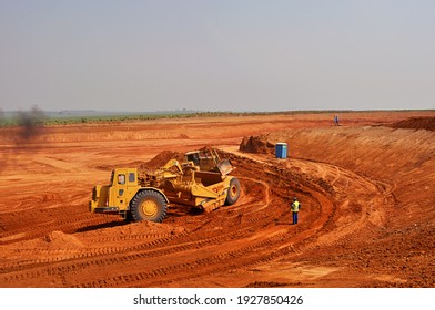 Engineer And Civil Construction With Tractors On Site