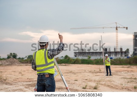 Engineer Construction Measurements Using Surveying Equipment Land - engineer in the construction measurements using surveying equipment land surveyors on the construction surveyor