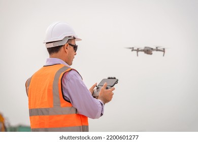 Engineer Construction Used Drone Take Photo Aerial View For Inspection And Survey At Construction Site.