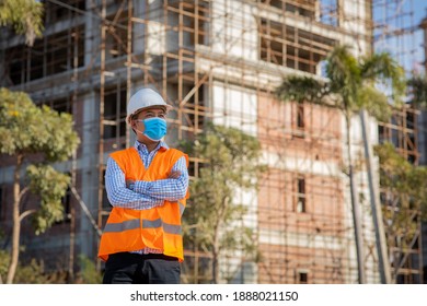 Engineer Construction Wearing Protective Mask The Spread Of Covid 19 Diseases During The Inspection In Construction Site. Safety Concept