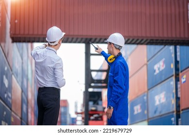 Engineer container cargo with worker working and checking stock into container for loading,logistic and business export.