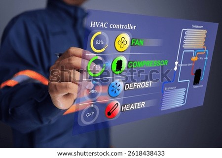 Engineer control air condition in the building through HVAC virtual dashboard system turning on the compressor and ventilation fan for the operation of evaporator and condenser of refrigeration system
