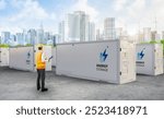 Engineer control energy storage system or battery container unit with cityscape background