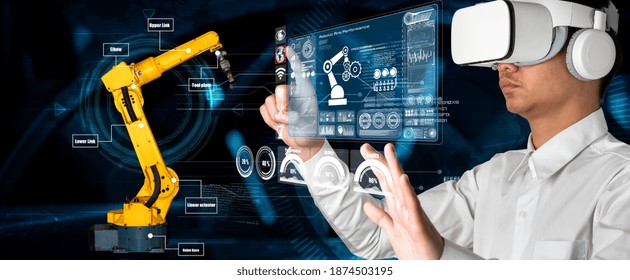 Engineer controls robotic arms by augmented reality industry technology application software. Smart robot machine in future factory working in concept of Industry 4.0 or 4th industrial revolution. - Powered by Shutterstock