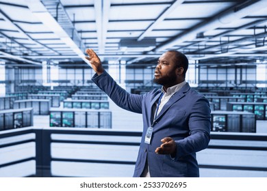 Engineer in data center implementing backup solutions to protect against data loss using AR hologram visualization. Server room worker resolving technical issues using augmented reality technology