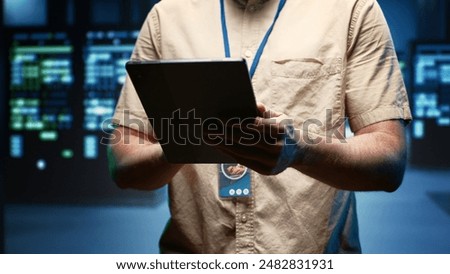 Engineer in data center providing dedicated VPN servers able to deliver enhanced security, privacy, encrypted sensitive data, online anonymity, secure internet connections, sufficient fast speed