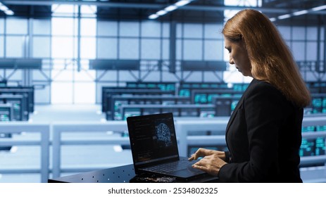 Engineer in data center using artificial intelligence computing simulating human brain thought processes in computerized model. Employee works on laptop with AI machine learning algorithms, camera A