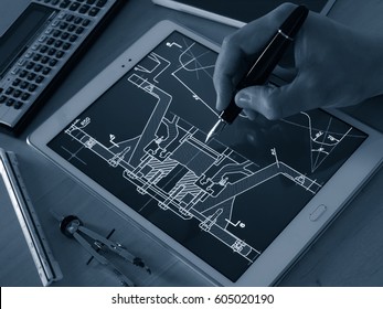 Engineer Designer Working On Cad Blueprint Using Tablet Computer Tool    