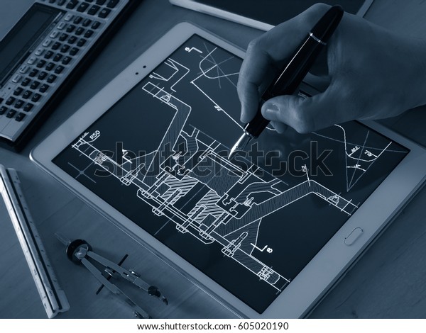 engineer designer working on cad blueprint using tablet
computer tool    