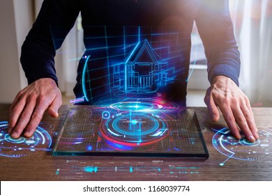 An Engineer Designs A High-energy House Using Sophisticated And Futuristic Programs With Holography. Concept Of: Home, Future, Project And Augmented Reality.