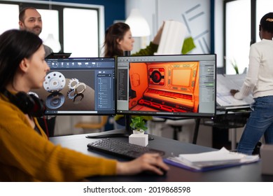 Engineer Developer Analyzing Cad Software To Develop Creative Video Game, Working In Startup Gaming Company For Prototype. Design Technician Studying On Computer Developing New Online Games