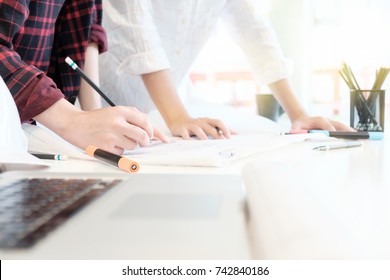 Engineer discussing meeting for architectural project working with partner and engineering tools on workplace Planning Design Draw Teamwork. - Shutterstock ID 742840186