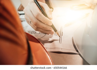 engineer discussing at the table with blueprint - Closeup on hands and project print,selective focus,Business concept vintage color