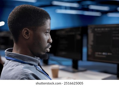 Engineer doing maintenance in data center facility to extend equipment life span and avoid downtime. Close up shot of IT expert monitoring servers for issues such as overheating or power fluctuations