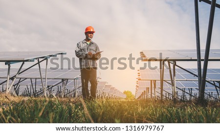 engineer or electrician inspect and checking solar equipment