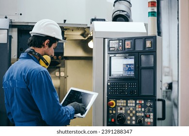 Engineer foreman thinking and working with computer laptop connecting to controlling machine at the manufacturing factory. Technician maintenance system or developing machinery - Powered by Shutterstock - Get 15% off with code: PIKWIZARD15