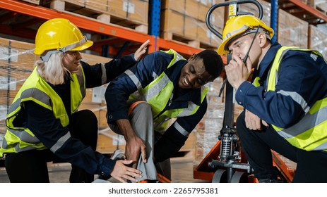 An engineer got into an accident at work causing bodily injuries. and received help from colleagues In areas warehouse on the concept of safe work.