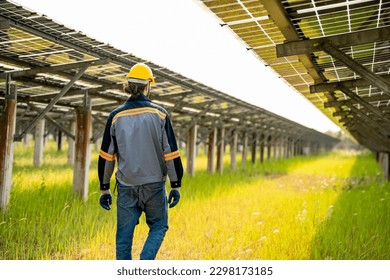 Engineer hand is installing and checking an operation of sun and cleanliness of photovoltaic solar panels, Engineer with energy measurement tool photovoltaic modules for renewable energy