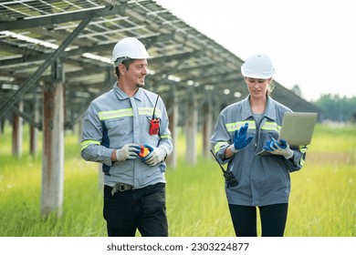 Engineer hand is installing and checking an operation of sun and cleanliness of photovoltaic solar panels, Engineer with energy measurement tool photovoltaic modules for renewable energy