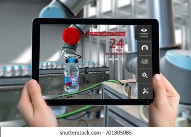 Engineer Hand Using Tablet, Automation Robot Arm Machine In Smart Factory With Tablet Real Time Vibration Analysis Monitoring System Application For Check Motor Failure. Industry 4th Sensor Concept.